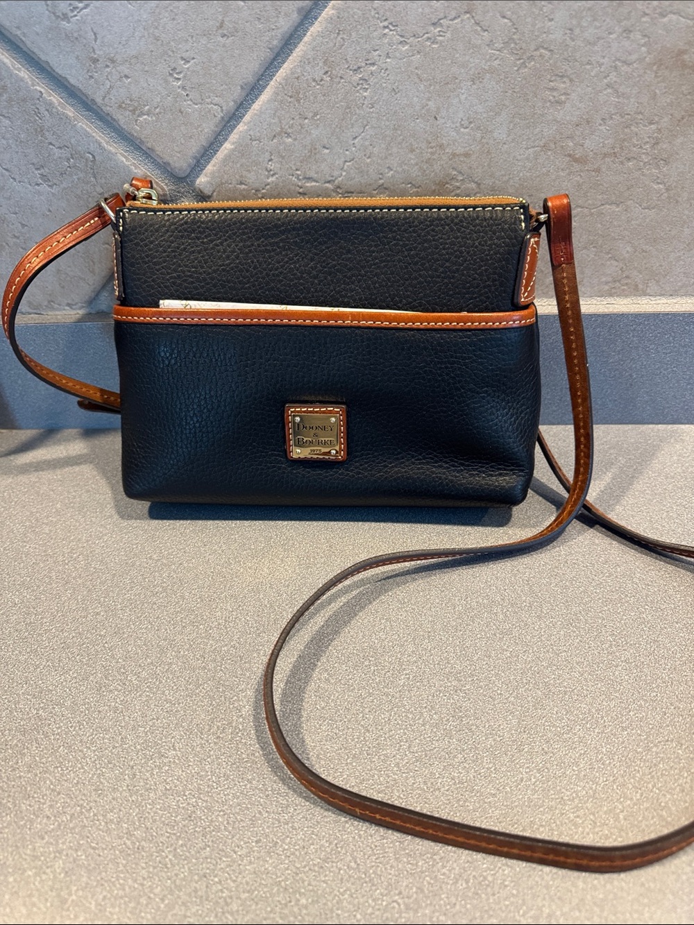 Dooney & Bourke Black with Brown Trim Pebbled Leather Crossbody